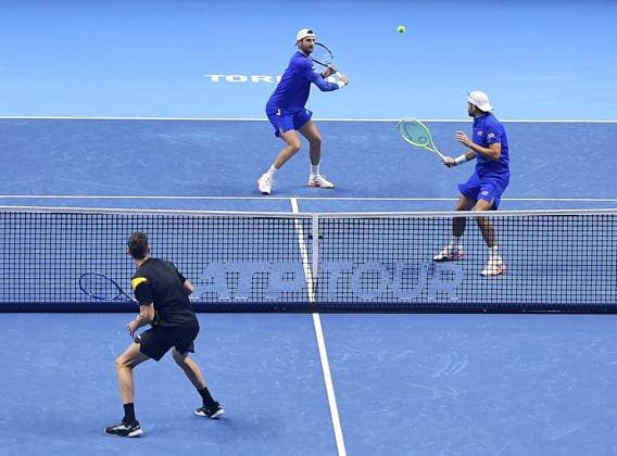 November 11, 2025, Torino, Italy: Simone Bolelli of Italy and Andrea Vavassori of Italy (up) in action during the Doubles Round Robin match against Marcel Granollers of Spain and Horacio Zeballos of Argentina at the ATP, Tennis Herren Finals in Turin, Italy, 11 November 2025. ANSA Alessandro Di Marco Nitto ATP Finals 2025  - ZUMAa110 20251111_zaf_a110_002 Copyright: xAnsa AlessandroxDixMarcox