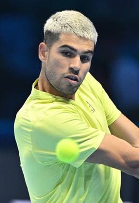November 11, 2025, Turin, Italy: Carlos Alcaraz of Spain in action during the men s singles Round Robin match against Taylor Fritz of USA at the ATP, Tennis Herren Finals in Turin, Italy, 11 November 2025. ANSA . ATP Finals Tennis Tournament  - ZUMAa110 20251111_zaf_a110_012 Copyright: xAlessandroxDixMarcox