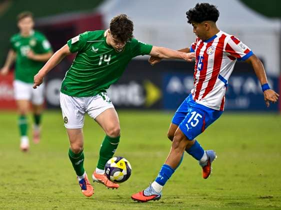 Republic of Ireland v Paraguay: Group J - FIFA U-17 World Cup Qatar 2025 Gavin Mcateer of Republic of Ireland and Aldo Sanabria of Paraguay in action during the FIFA U-17 World Cup Qatar 2025 Group J match between Republic of Ireland v Paraguay in Doha, Qatar, on November 11, 2025. DOHA Qatar Copyright: xNOUSHADxTHEKKAYILx