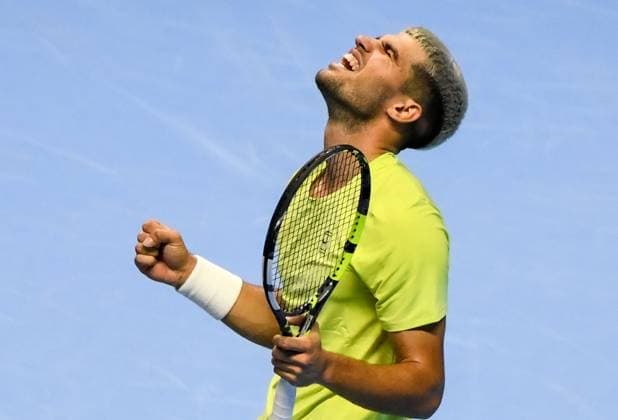 ITALY, TURIN - NOVEMBER 11, 2025: Carlos Alcaraz of Spain performs in his 2025 ATP, Tennis Herren Finals Jimmy Connors Group round-robin singles tennis match against Taylor Fritz of the United States at the Palasport Olimpico. Sergei Vishnevsky TASS  85609445