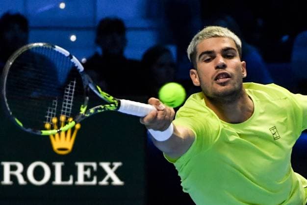 ITALY, TURIN - NOVEMBER 11, 2025: Carlos Alcaraz of Spain performs in his 2025 ATP, Tennis Herren Finals Jimmy Connors Group round-robin singles tennis match against Taylor Fritz of the United States at the Palasport Olimpico 2025 ATP Finals: Carlos Alcaraz 2 - 1 Taylor Fritz  - ZUMAt113 20251111_zaa_t113_348 Copyright: xSergeixVishnevskyx