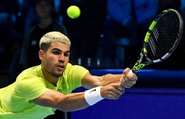 ITALY, TURIN - NOVEMBER 11, 2025: Carlos Alcaraz of Spain performs in his 2025 ATP, Tennis Herren Finals Jimmy Connors Group round-robin singles tennis match against Taylor Fritz of the United States at the Palasport Olimpico 2025 ATP Finals: Carlos Alcaraz 2 - 1 Taylor Fritz  - ZUMAt113 20251111_zaa_t113_352 Copyright: xSergeixVishnevskyx