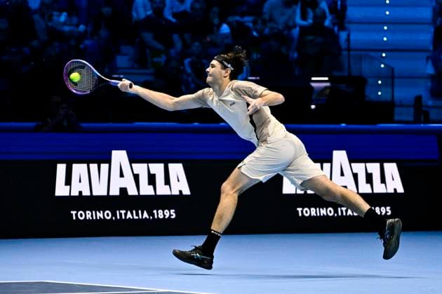 November 11, 2025: Carlos Alcaraz of Spain plays a backhand against Taylor Fritz of the United States during their Men s Single s Nitto ATP, Tennis Herren match during day three of the Nitto ATP Finals at Inalpi Arena on November 11, 2025 in Turin, Italy. - ZUMAg210 20251111_abp_g210_088 Copyright: xStefanoxGuidix