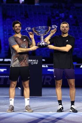 Cash Glasspool Lloyd Glasspool of Great Britain (R) and Julian Cash of Great Britain (L) pose with the year-end ATP, Tennis Herren doubles No. 1 trophy during Day three of the Nitto ATP World Tour Finals. Turin Inalpi Arena Italy Copyright: xMarcoxCanonierox
