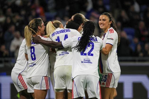 Lyon, France 11 November 2025 Champions League Women 2025 2026 OL Lyonnes vs VfL Wolfsburg In the picture scorer Wendie Renard OL , hidden in the picture, converts the penalty kick and scores the goal to make it 3-0 for OL Lyonnes and cheers with her teammates Groupama Stadium Copyright: xFotostandx xFantinix