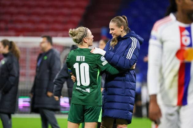 Lyon, France 11 November 2025 Champions League Women 2025 2026 OL Lyonnes vs VfL Wolfsburg In the picture from left Svenja Huth VfL and Julie Brand OL hug each other after the Champions League match in Lyon Groupama Stadium Copyright: xFotostandx xFantinix