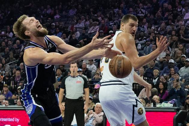 November 11, 2025, Sacramento, Ca, USA: Sacramento Kings center Domantas Sabonis (11) is fouled by Denver Nuggets center Nikola Jokic (15) during a game at the Golden 1 Center on Tuesday, Nov. 11, 2025, in Sacramento. Sacramento USA - ZUMAj89_ 20251111_zaf_j89_003 Copyright: xPaulxKitagakixJr.x