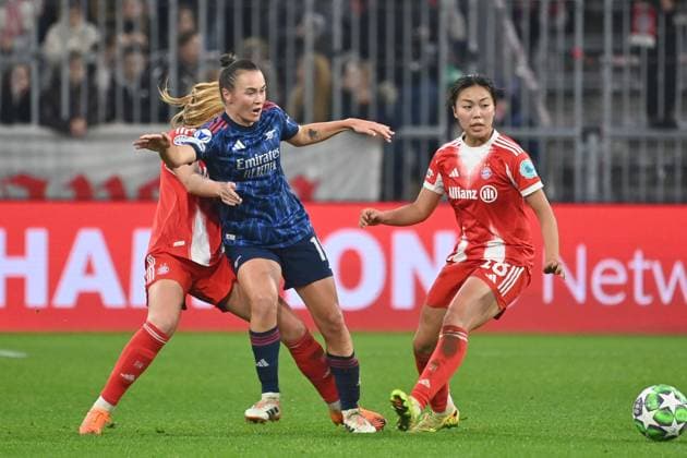 from left Glodis Perla VIGGOSDOTTIR FCB Katie McCabe Arsenal , Momoko TANIKAWA FCB action,duel against FC Bayern Muenchen Arsenal WFC Womens Champions League Matchday 3 on 12 11 2025 A L L I A N Z A R E N A