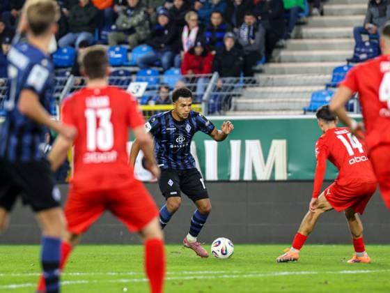 Samuel Abifade SV Waldhof Mannheim, 17 on the ball is targeted by Konrad Riehle FC Astoria Walldorf, 14 during the BfV Pokal quarterfinal SV Waldhof Mannheim 1860 Munich on 12 11 25 at Carl Benz Stadion, Mannheim xamx Photo Alfio Marino Copyright: