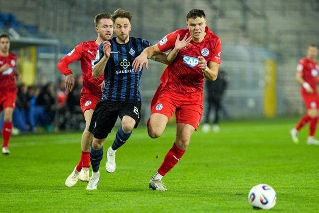 Soccer bfv ROTHAUS Cup, quarterfinals, SV Waldhof Mannheim FC Astoria Walldorf on 12 11 2025 in Mannheim Carl Benz Stadion , Germany, season 2025 2026 DFL REGULATIONS PROHIBIT ANY USE OF PHOTOGRAPHS AS IMAGE SEQUENCES AND OR QUASI VIDEO Dennis Egel 4, FCA in duel with Lukas Klünter 24, SVWM Mannheim Carl Benz Stadion Germany Copyright: xChristophxKinzingerx