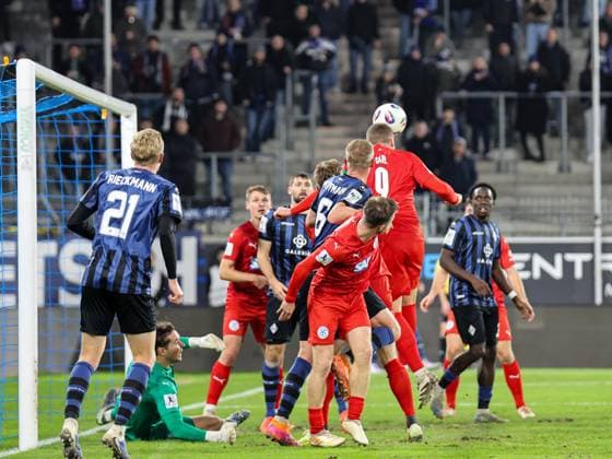 Marcel Carl FC Astoria Walldorf, 9 clears by head, Roy Dingler Referee whistles foul on Tim Bjarne Hansen FC Astoria Walldorf, 1 at BfV Pokal quarterfinal SV Waldhof Mannheim FC Astoria Walldorf on 12 11 25 at Carl Benz Stadion, Mannheim xamx Photo Alfio Marino Copyright: