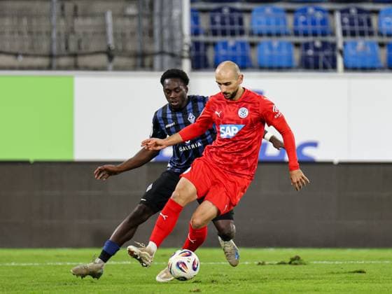 Iosif Maroudis FC Astoria Walldorf, 25 on the ball, behind him Kennedy Okpala SV Waldhof Mannheim, 32 at the BfV Pokal quarterfinal SV Waldhof Mannheim FC Astoria Walldorf on 12 11 25 at Carl Benz Stadion, Mannheim xamx Photo Alfio Marino Copyright: