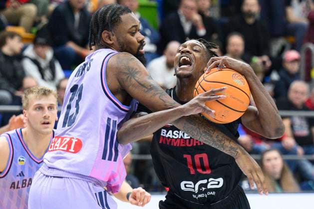 From left J Wan Roberts of Alba Berlin and Sir Jabari Rice of Nymburk in action during the Basketball Champions League group B round 4 match Nymburk vs Alba Berlin in Prague, Czech Republic, November 12, 2025. (CTKxPhoto MichalxKamaryt) CTKPhotoP2025111208109  CTKPhotoP2025111208109