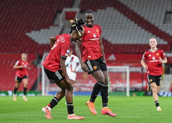 Manchester, England, 12th November 2025. Melvine Malard of Manchester United, ManU celebrates scoring her sides first goal during the Manchester United Women vs Paris St Germain Women UEFA Womens Champions League match at Old Trafford, Manchester. Picture credit should read: Cody Froggatt Sportimage EDITORIAL USE ONLY. No use with unauthorised audio, video, data, fixture lists, club league logos or live services. Online in-match use limited to 120 images, no video emulation. No use in betting, games or single club league player publications. SPI_026_CF_MANCHESTER_UTD_WOMEN_V_PARIS_ST_GERMAIN_WOMEN SPI-4282-0025