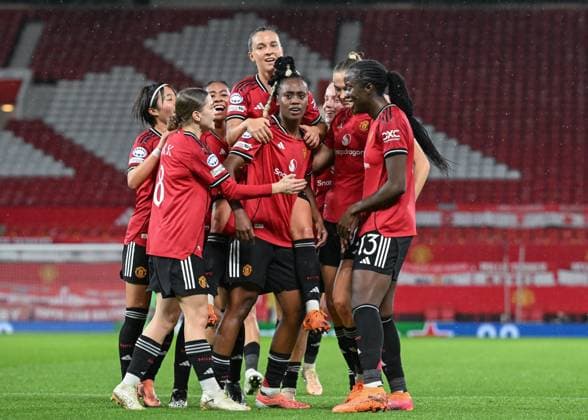 Manchester, England, 12th November 2025. Melvine Malard of Manchester United, ManU celebrates scoring her sides first goal during the Manchester United Women vs Paris St Germain Women UEFA Womens Champions League match at Old Trafford, Manchester. Picture credit should read: Cody Froggatt Sportimage EDITORIAL USE ONLY. No use with unauthorised audio, video, data, fixture lists, club league logos or live services. Online in-match use limited to 120 images, no video emulation. No use in betting, games or single club league player publications. SPI_027_CF_MANCHESTER_UTD_WOMEN_V_PARIS_ST_GERMAIN_WOMEN SPI-4282-0026