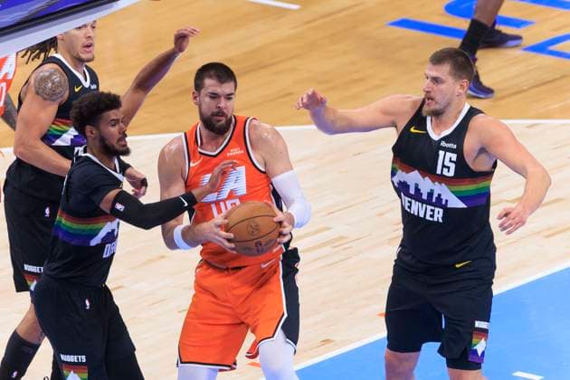 November 12, 2025, Inglewood, California, USA: Cameron Johnson 23 and Nikola Jokic 15 of the Denver Nuggets defend the basket from Ivica Zubac 40 of the Los Angeles Clippers during their regular season NBA, Basketball Herren, USA game on Wednesday November 12, 2025 at Intuit Dome in Inglewood, California. Clippers lose to Nuggets, 116-130. ARIANA RUIZ PI Inglewood USA - ZUMAp124 20251112_zaa_p124_055 Copyright: xArianaxRuizx