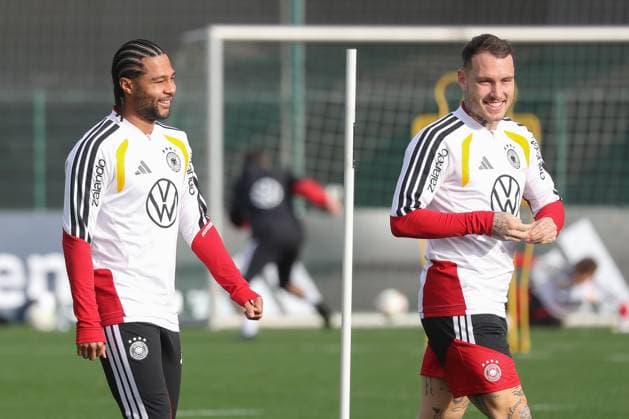 13 11 2025, xgox, football national team training emspor, v l Serge Gnabry Germany, , David Raum Germany, DFL DFB REGULATIONS PROHIBIT ANY USE OF PHOTOGRAPHS as IMAGE SEQUENCES and or QUASI VIDEO Wolfsburg
