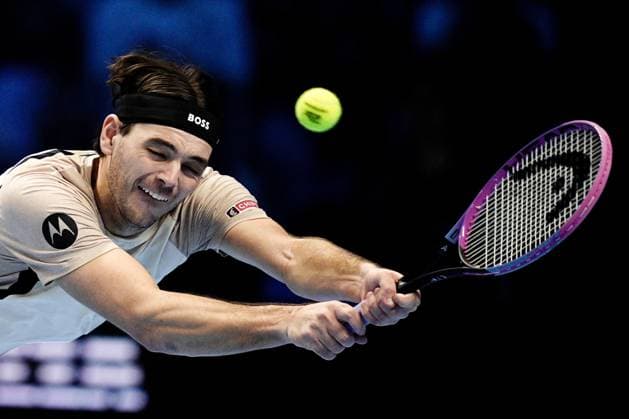 United States™ Taylor Fritz returns the ball to Australia s Alex de Minaur during the singles tennis match of the ATP, Tennis Herren World Tour Finals at the Inalpi Arena in Turin, Italy - Thursday, Nov. 13, 2025. -  Copyright: xMarcoxAlpozzi LaPressex