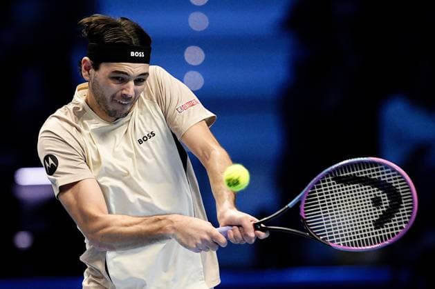 United States™ Taylor Fritz returns the ball to Australia s Alex de Minaur during the singles tennis match of the ATP, Tennis Herren World Tour Finals at the Inalpi Arena in Turin, Italy - Thursday, Nov. 13, 2025. -  Copyright: xMarcoxAlpozzi LaPressex
