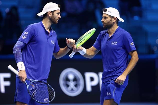 Krawietz Puetz vs Bolelli Vavassori Simone Bolelli of Italy and Andrea Vavassori celebrate during the Round Robin doubles match between Kevin Krawietz of Germany and Tim Puetz of Germany against Simone Bolelli of Italy and Andrea Vavassori of Italy on Day five of the Nitto ATP, Tennis Herren World Tour Finals. Turin Inalpi Arena Italy Copyright: xMarcoxCanonierox