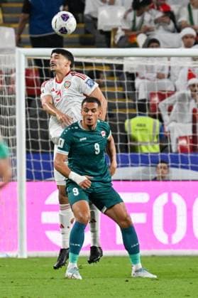 UAE v Iraq - 2026 AFC World Cup Qualifiers ABU DHABI, UNITED ARAB EMIRATES - NOVEMBER 13: Lucas Pimenta (L) of UAE in action against Ali Al-Hamadi (R) of Iraq during the first match of the fifth round of the 2026 FIFA World Cup, WM, Weltmeisterschaft, Fussball Asian Qualifiers at the Mohammed bin Zayed Stadium in Abu Dhabi, United Arab Emirates, on November 13, 2025. Waleed Zein Anadolu Abu Dhabi United Arab Emirates. Editorial use only. Please get in touch for any other usage.  Copyright: x2025xAnadoluxWaleedxZeinx