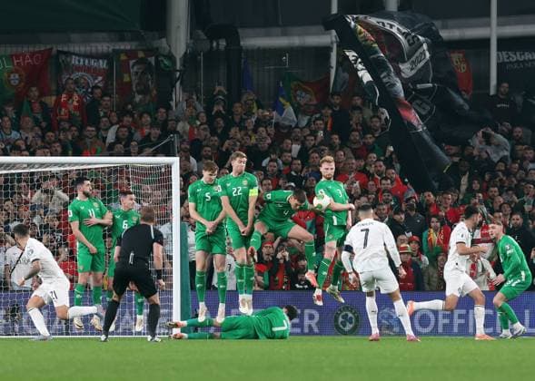 Dara O Shea of the Republic of Ireland blocks the ball as Cristiano Ronaldo of Portugal takes a free kick Republic of Ireland v Portugal, FIFA 2026 World Cup Qualifying, Group F, Football, Aviva Stadium, Dublin, Ireland - 13 Nov 2025Dublin Aviva Stadium Ireland EDITORIAL USE ONLY No use with unauthorised audio, video, data, fixture lists, club league logos or live services. Online in-match use limited to 120 images, no video emulation. No use in betting, games or single club league player publications. Copyright: xLorrainexO Sullivan Shutterstockx 15759346l