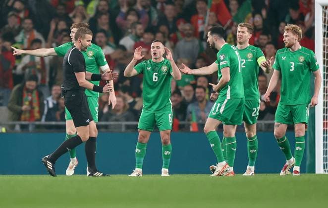 2026 FIFA World Cup, WM, Weltmeisterschaft, Fussball Qualifier Group F, Aviva Stadium, Dublin 13 11 2025 Republic of Ireland vs Portugal Ireland s Josh Cullen reacts to Referee Glenn Nyberg awarding a free kick after a hand ball Josh Cullen reacts to Glenn Nyberg awarding a free kick after a hand ball 13 11 2025  Copyright: x INPHO NickxElliottx IMG_6856