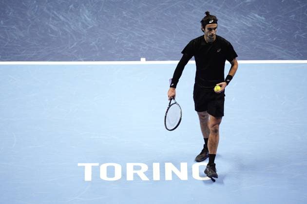 Italy s Lorenzo Musetti returns the ball to Carlos Alcaraz during the singles tennis match of the ATP, Tennis Herren World Tour Finals at the Inalpi Arena in Turin, Italy - Thursday, Nov. 13, 2025. -  Copyright: xMarcoxAlpozzi LaPressex