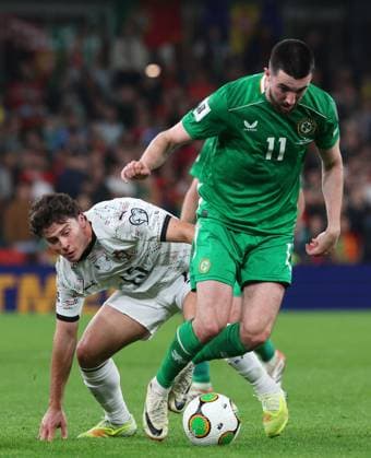 Finn Azaz of the Republic of Ireland is challenged by Joao Neves of Portugal Republic of Ireland v Portugal, FIFA 2026 World Cup Qualifying, Group F, Football, Aviva Stadium, Dublin, Ireland - 13 Nov 2025Dublin Aviva Stadium Ireland EDITORIAL USE ONLY No use with unauthorised audio, video, data, fixture lists, club league logos or live services. Online in-match use limited to 120 images, no video emulation. No use in betting, games or single club league player publications. Copyright: xLorrainexO Sullivan Shutterstockx 15759346af