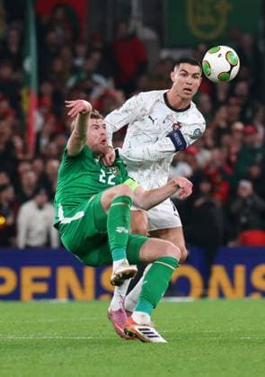 Cristiano Ronaldo of Portugal challenges Nathan Collins of the Republic of Ireland Republic of Ireland v Portugal, FIFA 2026 World Cup Qualifying, Group F, Football, Aviva Stadium, Dublin, Ireland - 13 Nov 2025Dublin Aviva Stadium Ireland EDITORIAL USE ONLY No use with unauthorised audio, video, data, fixture lists, club league logos or live services. Online in-match use limited to 120 images, no video emulation. No use in betting, games or single club league player publications. Copyright: xLorrainexO Sullivan Shutterstockx 15759346ag