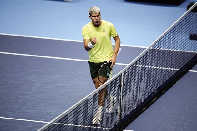 Spain s Carlos Alcaraz react after a point against Lorenzo Musetti during the singles tennis match of the ATP, Tennis Herren World Tour Finals at the Inalpi Arena in Turin, Italy - Thursday, Nov. 13, 2025. -  Copyright: xMarcoxAlpozzi LaPressex