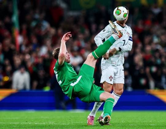 2026 FIFA World Cup, WM, Weltmeisterschaft, Fussball Qualifier Group F, Aviva Stadium, Dublin 13 11 2025 Republic of Ireland vs Portugal Ireland s Nathan Collins and Portugal s Cristiano Ronaldo Nathan Collins and Cristiano Ronaldo 13 11 2025  Copyright: x INPHO RyanxByrnex RB2_6200