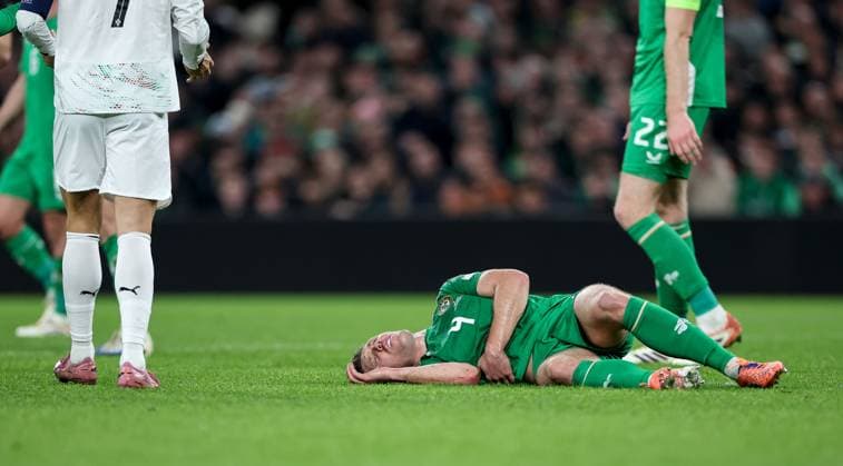 2026 FIFA World Cup, WM, Weltmeisterschaft, Fussball Qualifier Group F, Aviva Stadium, Dublin 13 11 2025 Republic of Ireland vs Portugal Ireland s Dara O Shea down injured after being challenged by Portugal s Cristiano Ronaldo which resulted in a red card Dara O Shea down injured after being challenged by Cristiano Ronaldo which resulted in a red card 13 11 2025  Copyright: x INPHO NickxElliottx IMG_9310