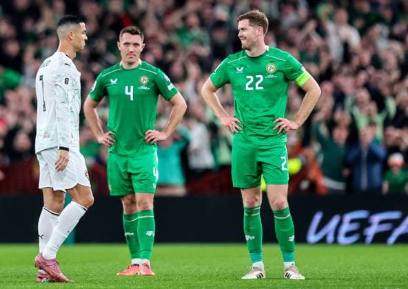 2026 FIFA World Cup, WM, Weltmeisterschaft, Fussball Qualifier Group F, Aviva Stadium, Dublin 13 11 2025 Republic of Ireland vs Portugal Ireland s Dara O Shea and Nathan Collins look on as Portugal s Cristiano Ronaldo leaves the pitch after a red card Dara O Shea and Nathan Collins look on as Cristiano Ronaldo leaves the pitch after a red card 13 11 2025  Copyright: x INPHO RyanxByrnex RB2_7117