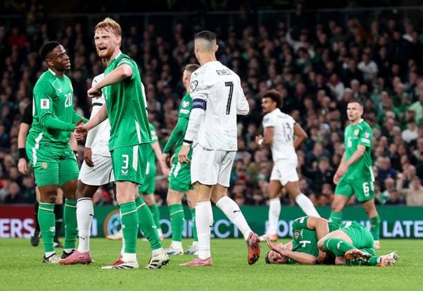 2026 FIFA World Cup, WM, Weltmeisterschaft, Fussball Qualifier Group F, Aviva Stadium, Dublin 13 11 2025 Republic of Ireland vs Portugal Ireland s Dara O Shea down injured after being challenged by Portugal s Cristiano Ronaldo Dara O Shea down injured after being challenged by Cristiano Ronaldo 13 11 2025  Copyright: x INPHO NickxElliottx BI7I8478