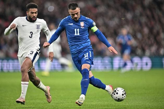 LONDON, ENGLAND - NOVEMBER 13: Reece James of national team, Nationalteam of England and Filip Kostic of National team of Serbia battle for a ball during the FIFA World Cup, WM, Weltmeisterschaft, Fussball 2026 qualifier match between England and Serbia at Wembley Stadium on November 13, 2025 in London, England. Photo Sebastian Frej England v Serbia - FIFA World Cup 2026 Qualifier Copyright: xSebastianxFrejx