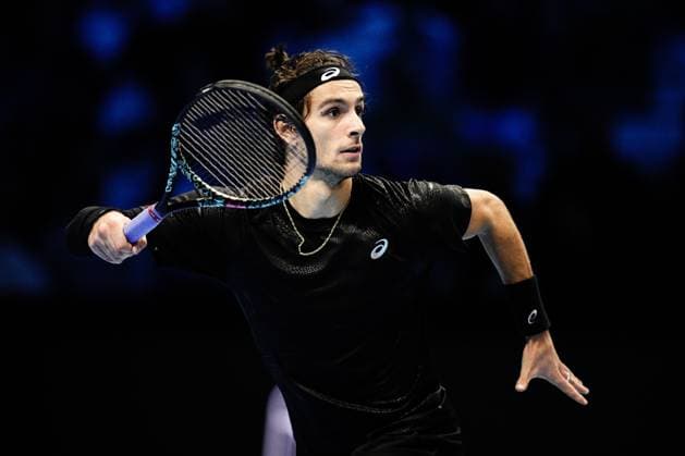 Italy s Lorenzo Musetti react during the singles tennis match of the ATP, Tennis Herren World Tour Finals againsSpain s Carlos Alcaraz at the Inalpi Arena in Turin, Italy - Thursday, Nov. 13, 2025. -  Copyright: xMarcoxAlpozzi LaPressex