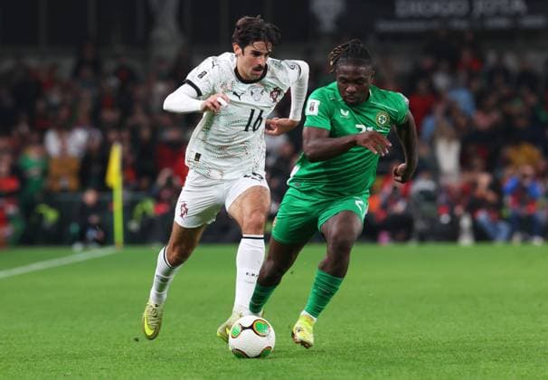 Francisco Trincao of Portugal is pressured by Festy Ebosele of the Republic of Ireland Republic of Ireland v Portugal, FIFA 2026 World Cup Qualifying, Group F, Football, Aviva Stadium, Dublin, Ireland - 13 Nov 2025Dublin Aviva Stadium Ireland EDITORIAL USE ONLY No use with unauthorised audio, video, data, fixture lists, club league logos or live services. Online in-match use limited to 120 images, no video emulation. No use in betting, games or single club league player publications. Copyright: xLorrainexO Sullivan Shutterstockx 15759346bb
