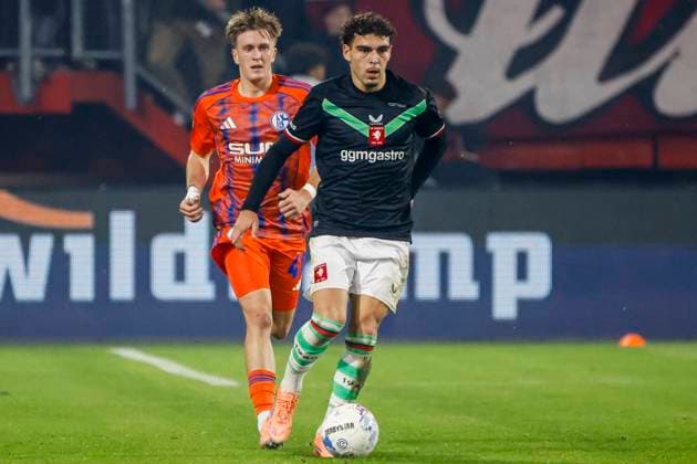 Guilherme Peixoto of FC Twente dribbles with the ball FC Twente v FC Schalke 04, 60th Anniversary Game, FC Twente v Schalke 04, De Grolsch Veste Stadium, November 13, 2025, Enschede, Netherlands.