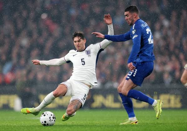 Elliot Anderson of England with Filip Kostic of Serbia England v Serbia - UEFA World Cup Qualifiers - Group K. Football. Wembley Stadium, London. UK. 13 NOV 2025Wembley Wembley Stadium London United Kingdom Editorial use only  Copyright: xJASONPIX Shutterstockx 15785832az