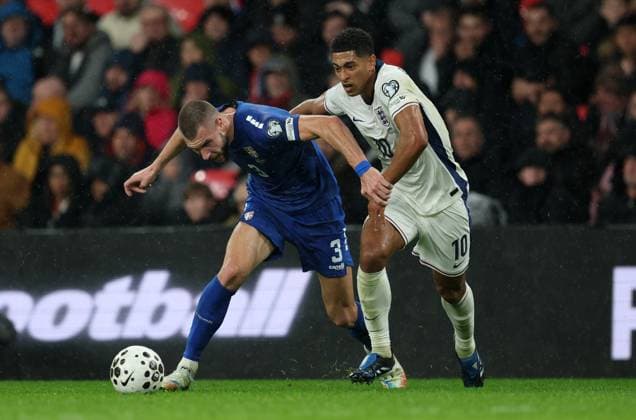 Jude Bellingham of England with Strahinja Pavlovic of Serbia England v Serbia - UEFA World Cup Qualifiers - Group K. Football. Wembley Stadium, London. UK. 13 NOV 2025Wembley Wembley Stadium London United Kingdom Editorial use only  Copyright: xJASONPIX Shutterstockx 15785832ey
