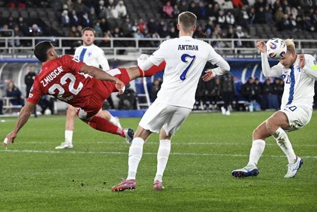 Malta s Zach Muscat (L) tries to stop Finland s attack of Benjamin Källman (background), Oliver Antman (7) and Joel Pohjanpalo during the FIFA World Cup, WM, Weltmeisterschaft, Fussball 2026 Group G European qualification football match between Finland and Malta in Helsinki, Finland, on November 14, 2025. Helsinki Finland LKFTJK20251114191422TWUE  Copyright: xHeikkixSaukkomaax LKFTJK20251114191422TWUE