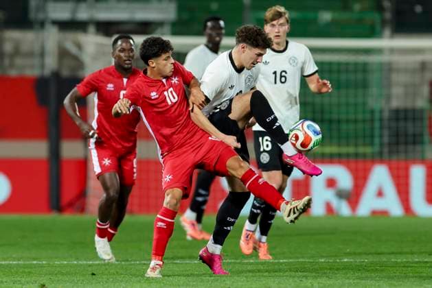 Jake Grech Malta and Mert Koemuer Germany battle for the ball, UEFA Under21 Championship Group F MD 6, Germany U21 v Malta U21, Sportpark Ronhof Thomas Sommer, November 14, 2025 in Furth, Germany Photo by Marco Steinbrenner DeFodi Images Jake Grech Malta and Mert Koemuer Germany battle for the ball, UEFA Under21 Championship Group F MD 6, Germany U21 v Malta U21, Sportpark Ronhof Thomas Sommer, November 14, 2025 in Furth, Germany Photo by Marco Steinbrenner DeFodi Images DFB DFL REGULATIONS PROHIBIT ANY USE OF PHOTOGRAPHS AS IMAGE SEQUENCES AND OR QUASI VIDEO