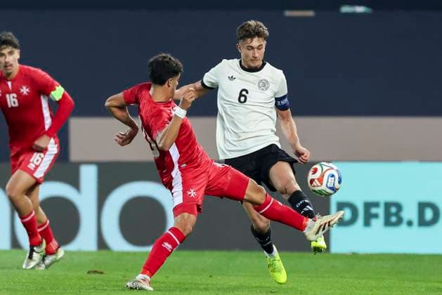 Jake Grech Malta and Tom Bischof Germany battle for the ball, UEFA Under21 Championship Group F MD 6, Germany U21 v Malta U21, Sportpark Ronhof Thomas Sommer, November 14, 2025 in Furth, Germany Photo by Marco Steinbrenner DeFodi Images Jake Grech Malta and Tom Bischof Germany battle for the ball, UEFA Under21 Championship Group F MD 6, Germany U21 v Malta U21, Sportpark Ronhof Thomas Sommer, November 14, 2025 in Furth, Germany Photo by Marco Steinbrenner DeFodi Images DFB DFL REGULATIONS PROHIBIT ANY USE OF PHOTOGRAPHS AS IMAGE SEQUENCES AND OR QUASI VIDEO