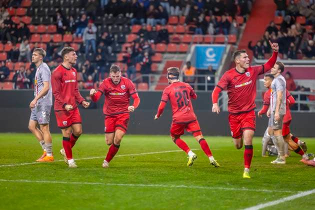 Ingolstadt, Germany 14 November 2025 Toto Cup 1 4 Final 2025 2026 FC Ingolstadt 04 vs SSV Jahn Regensburg In the picture from right scorer Jonas Scholz FCI celebrates after his goal to 1 1 with his teammates, Audi Sportpark Bayern Copyright: xFotostandx xSchäferx