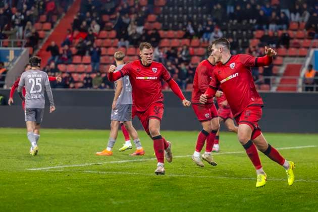 Ingolstadt, Germany 14 November 2025 Toto Cup 1 4 Final 2025 2026 FC Ingolstadt 04 vs SSV Jahn Regensburg In the picture from right scorer Jonas Scholz FCI celebrates after his goal to 1 1 with his teammates, Audi Sportpark Bayern Copyright: xFotostandx xSchäferx