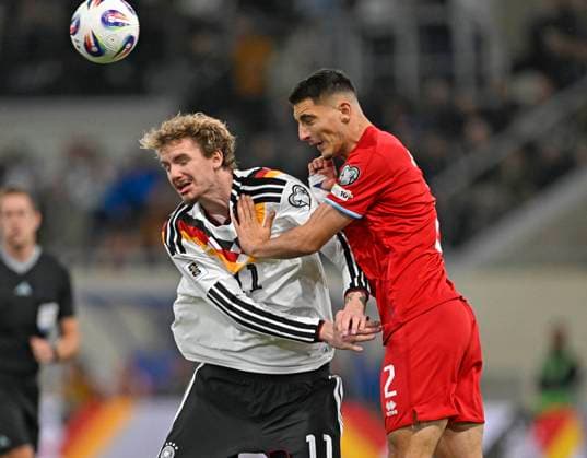 14 11 2025, Football World Cup Qualification Europe 2025 26, Matchday 9, Luxembourg Germany, at Stade de Luxembourg Croix de Gasperich, Luxembourg , v l Nick Woltemade Germany v Seid Korac Luxembourg