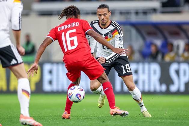14 11 2025, Football, International match, World Cup Qualification Europe, Germany Luxembourg, Stade de Luxembourg Croix de Gasperich, Luxembourg , 9 Matchday, Season 2025 2026 Leandro Barreiro LUX 16 in duel against Leroy Sane GER 19 Regulations prohibit any use of photographs as image sequences and or quasi video Luxembourg