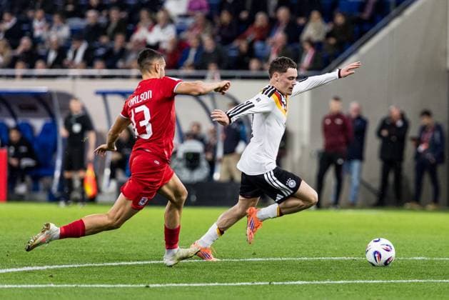 FIFA World Cup UEFA Qualifiers Luxembourg Germany 14 11 2025 duel Dirk Carlson Luxembourg, 13 , Florian Wirtz Germany, 17 FIFA World Cup UEFA Qualifiers Luxembourg Germany Luxembourg, Stade de Luxembourg, 14 11 2025 Copyright: xBEAUTIFULxSPORTS Wunderlx