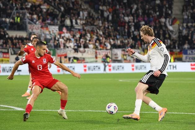 14 11 2025, Football, Men, Qualification, European Qualifiers, Luxembourg Germany, Nick Woltemade Germany , Dirk Carlson Luxembourg Luxembourg Luxembourg Stade de Luxembourg Luxembourg Luxembourg LUX Copyright: xSebastianxBachx